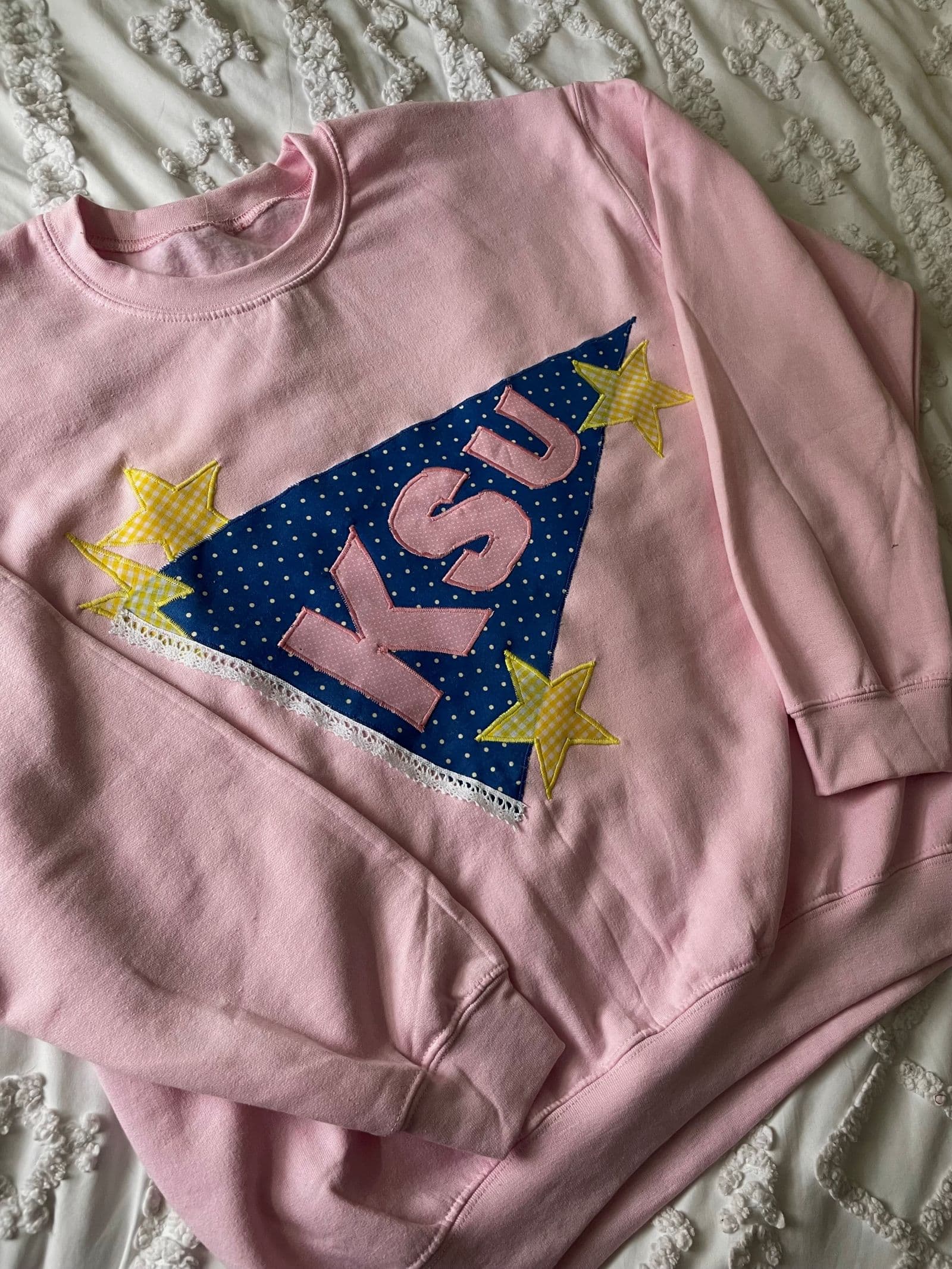 Pink sweatshirt with KSU Flag